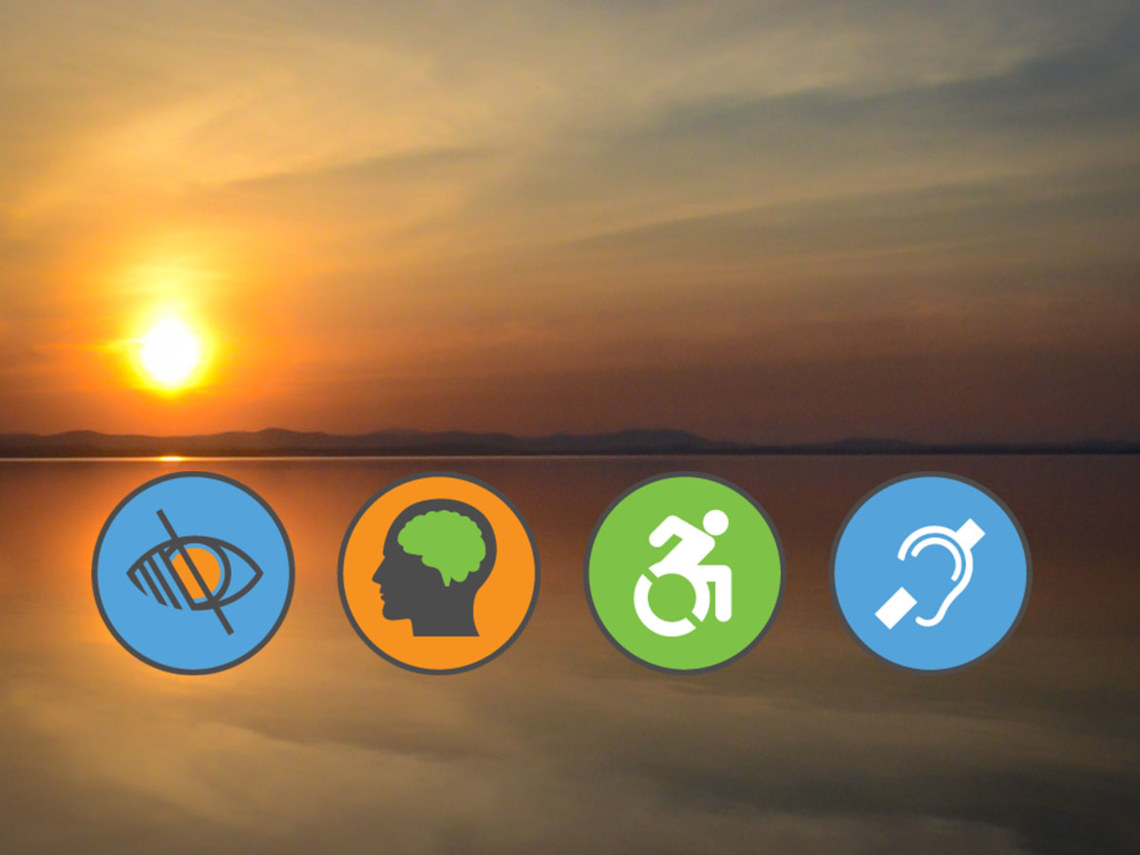 sunrise over lake with accessibility icons under the horizon
